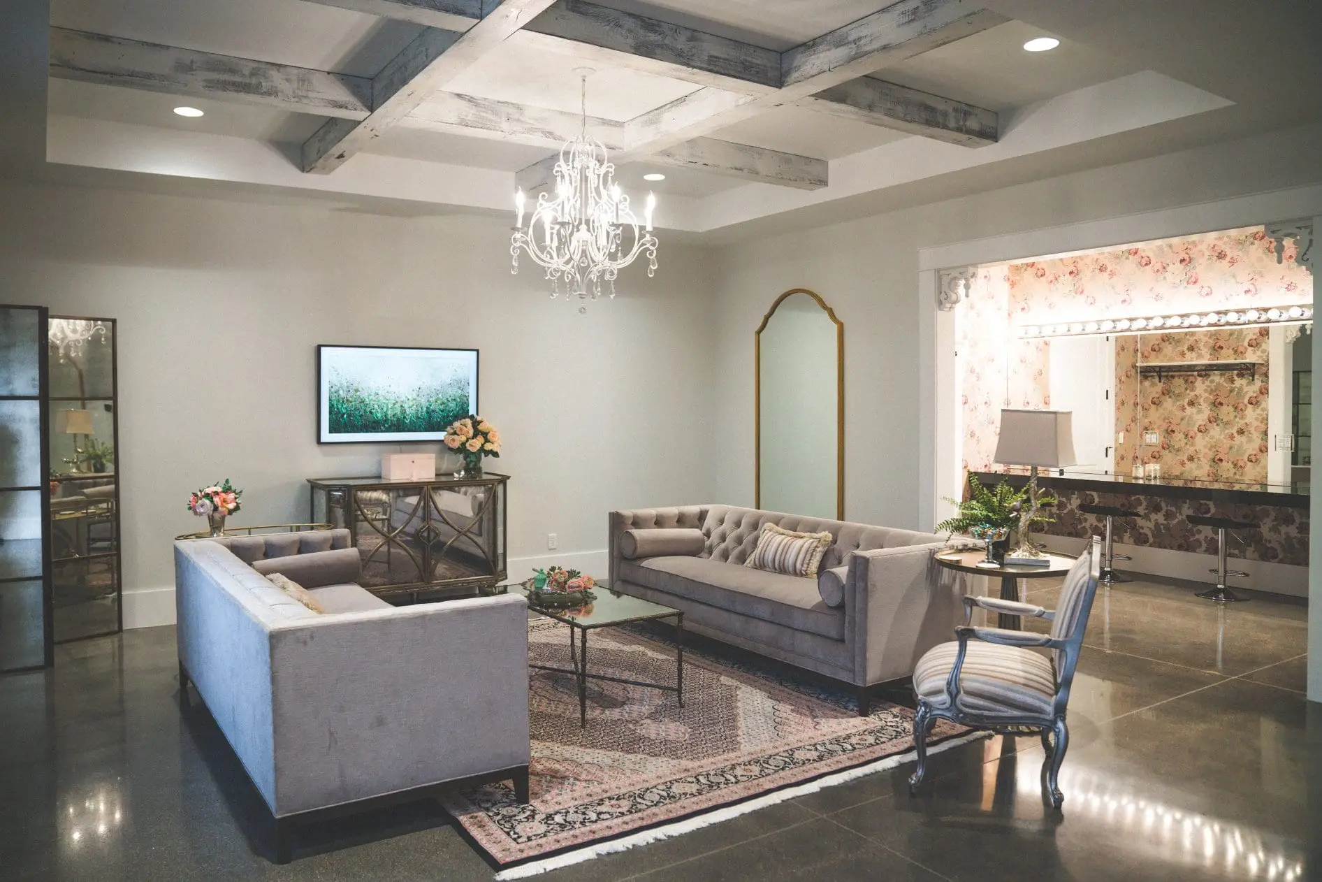 The bridal suite with sofas and a chandelier