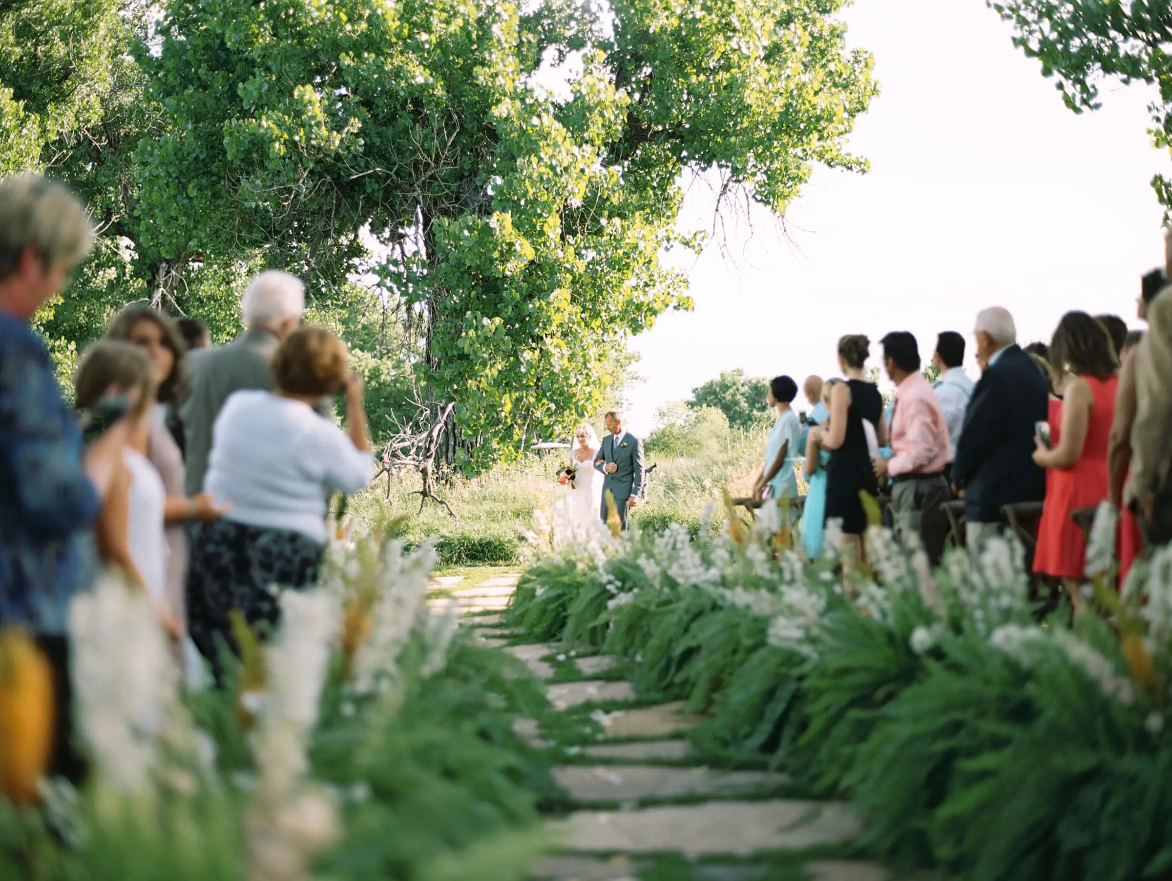 The flagstone aisle lined with grasses
