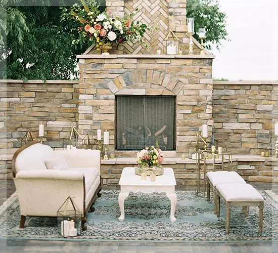 Lounge seating in front of the stone fireplace