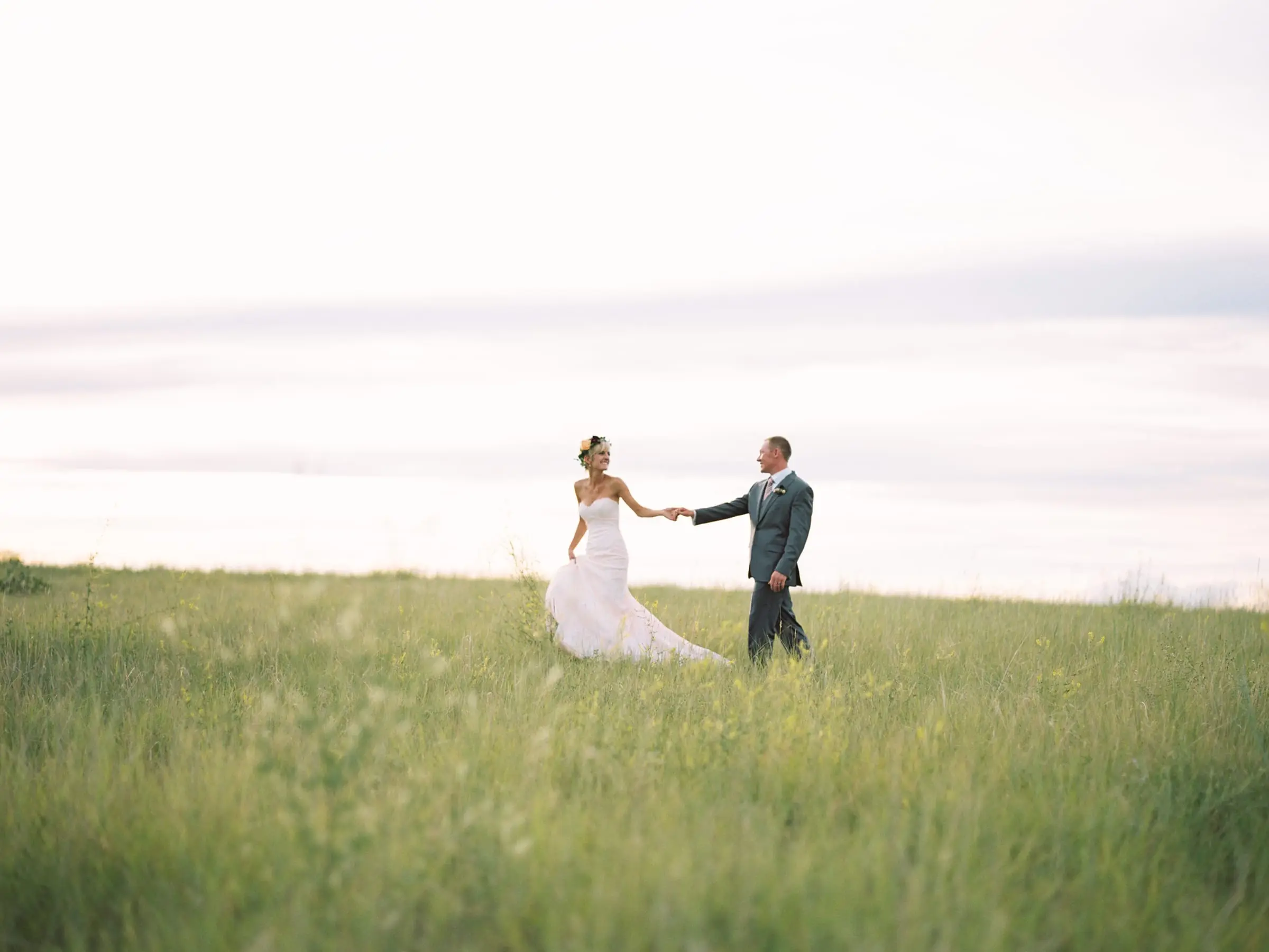 A couple walking in the meadow