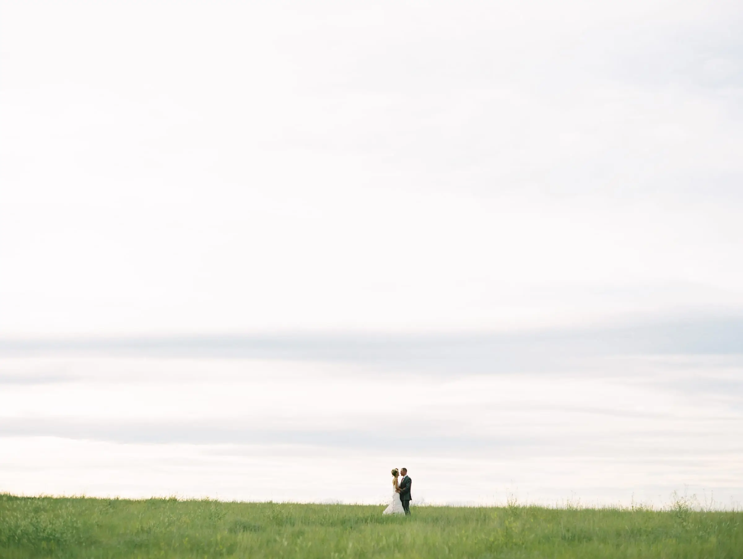 Couple small against the open prairie